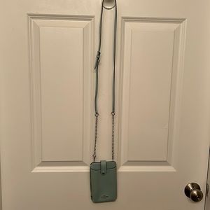 Coach cross, body phone holder